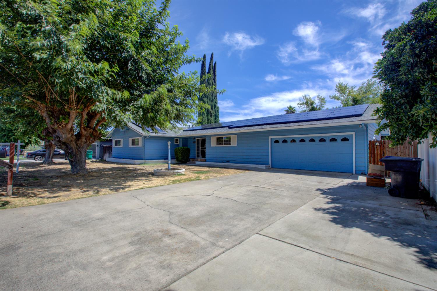 2982 Sequoia Drive Merced, CA 95340 - Photo 1 of 33 a front view of a house with a yard and garage