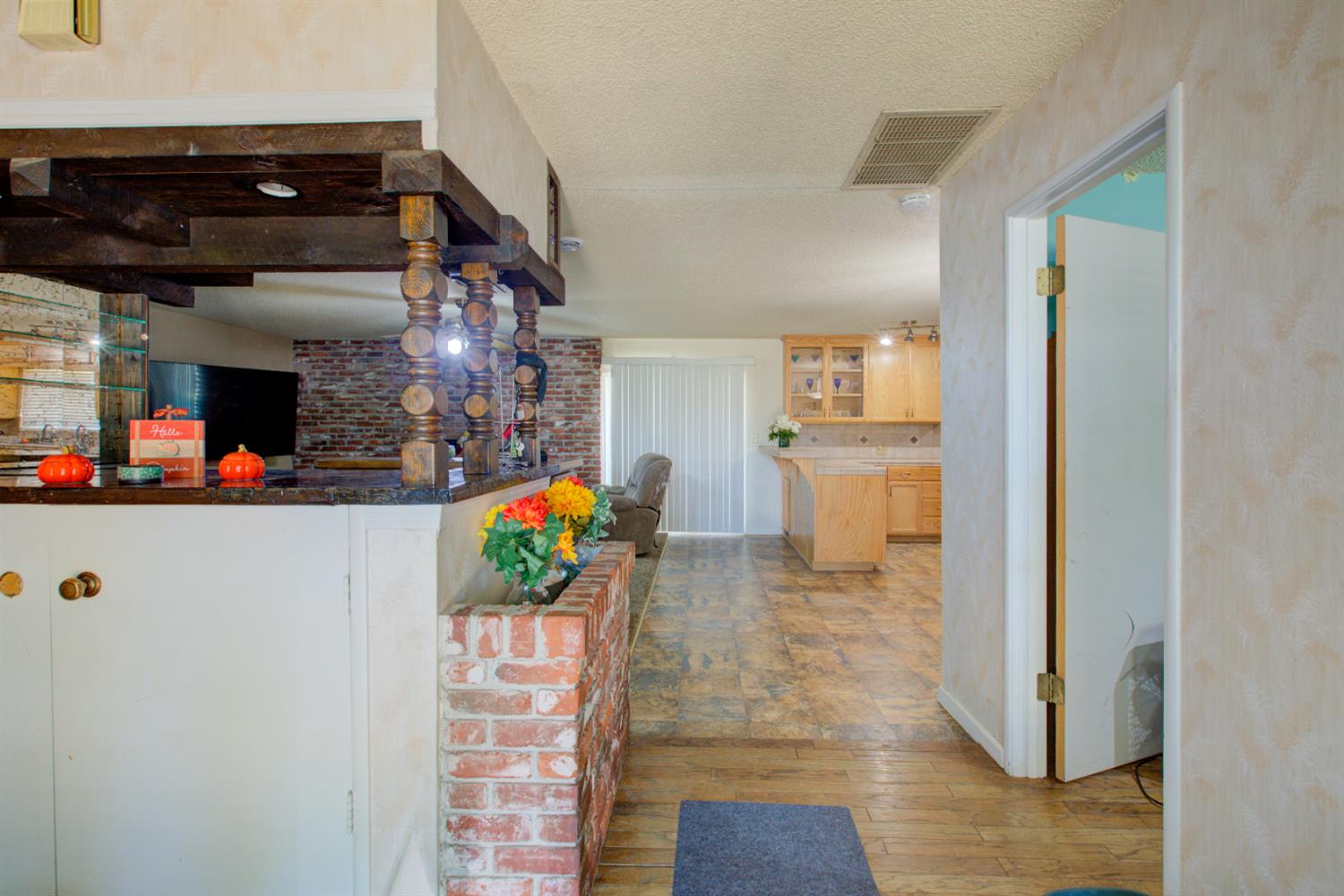 2982 Sequoia Drive Merced, CA 95340 - Photo 15 of 33 a view of a hallway with dining area