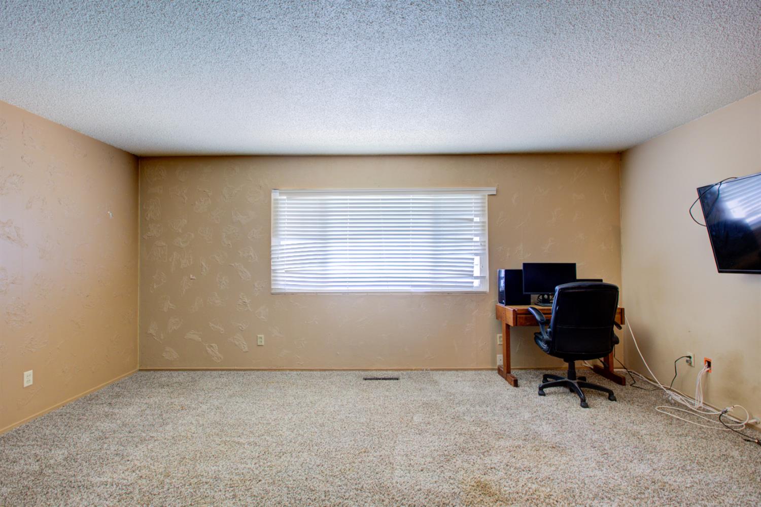 2982 Sequoia Drive Merced, CA 95340 - Photo 21 of 33 a view of workspace with a window