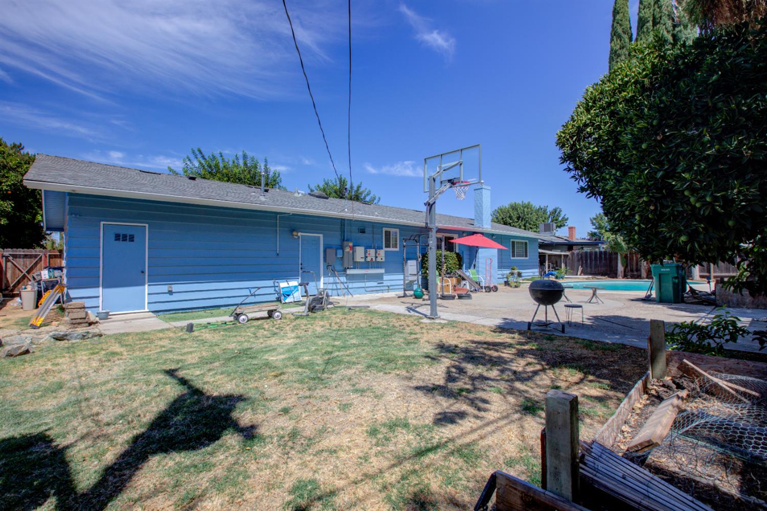 2982 Sequoia Drive Merced, CA 95340 - Photo 29 of 33 a house view with a sitting space fire pit and outdoor space