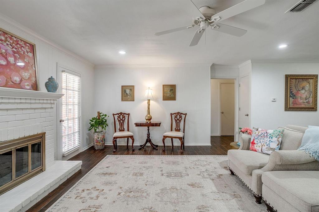 1147 Roaring Springs Road Fort Worth, TX 76114 - Photo 11 of 36 a living room with furniture or couch and a fireplace