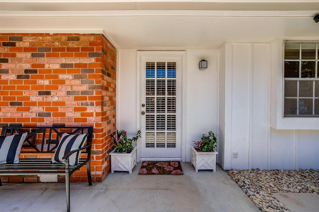 1147 Roaring Springs Road Fort Worth, TX 76114 - Photo 29 of 36 a balcony with furniture and window