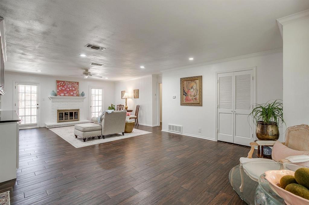 1147 Roaring Springs Road Fort Worth, TX 76114 - Photo 7 of 36 a living room with furniture window and wooden floor
