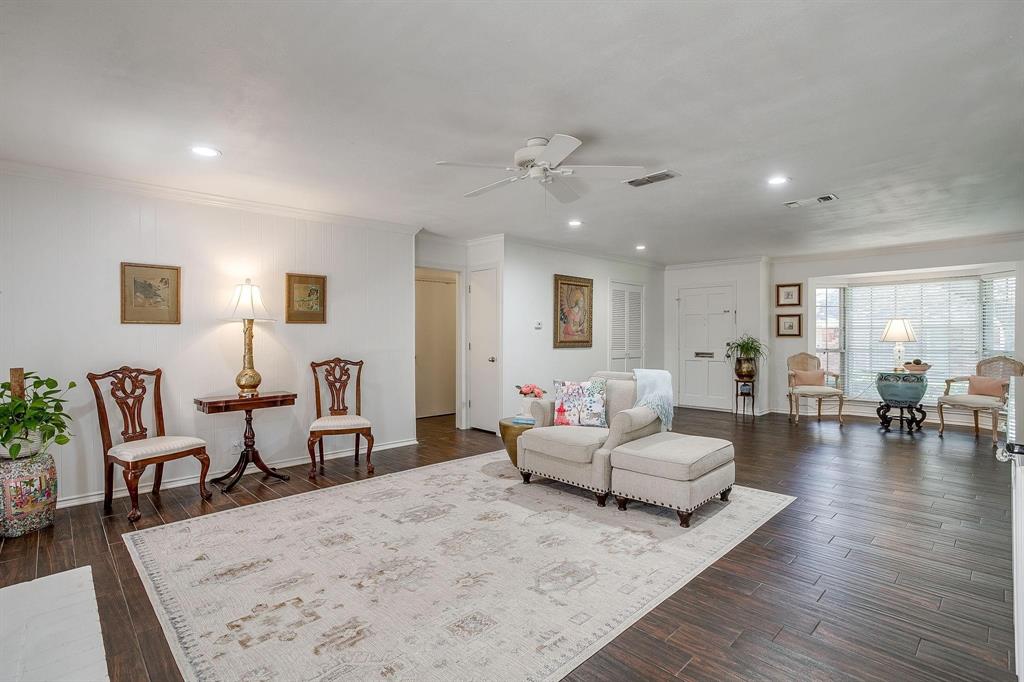 1147 Roaring Springs Road Fort Worth, TX 76114 - Photo 10 of 36 a living room with furniture and wooden floor