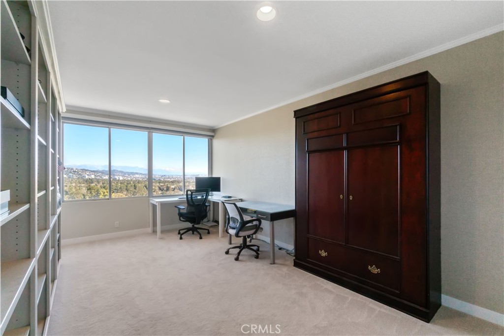 875 Comstock Avenue, Unit 16A Los Angeles, CA 90024 - Photo 20 of 28 a view of workspace with window and lounge chair