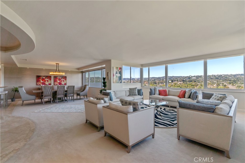 875 Comstock Avenue, Unit 16A Los Angeles, CA 90024 - Photo 5 of 28 a living room with furniture and a large window