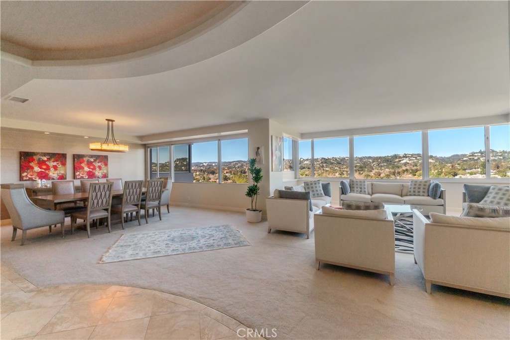 875 Comstock Avenue, Unit 16A Los Angeles, CA 90024 - Photo 6 of 28 a living room with furniture and a large window