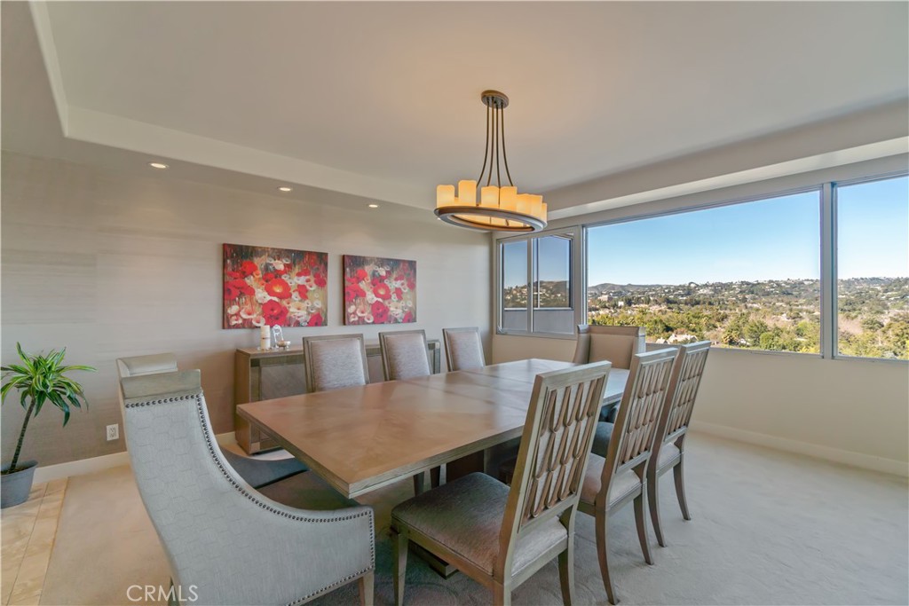 875 Comstock Avenue, Unit 16A Los Angeles, CA 90024 - Photo 9 of 28 a view of a dining room with furniture window and outside view