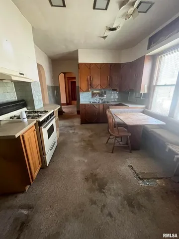 a bathroom with a sink a vanity and a mirror