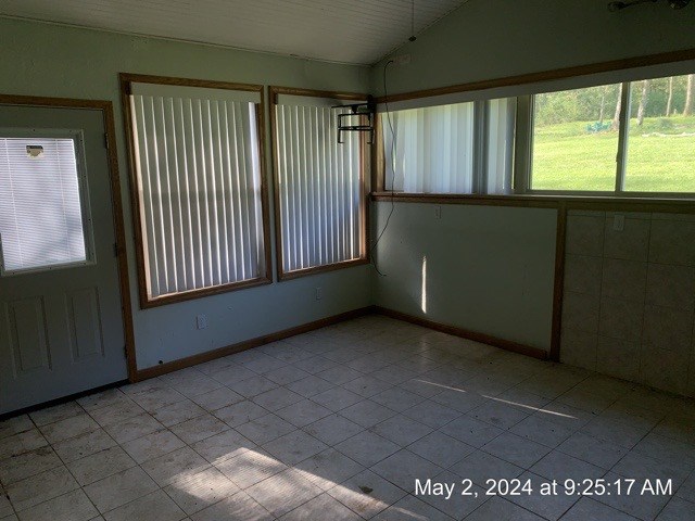 1722 Maple Road New Bethlehem, PA 16242 - Photo 6 of 19 an empty room with wooden floor and windows