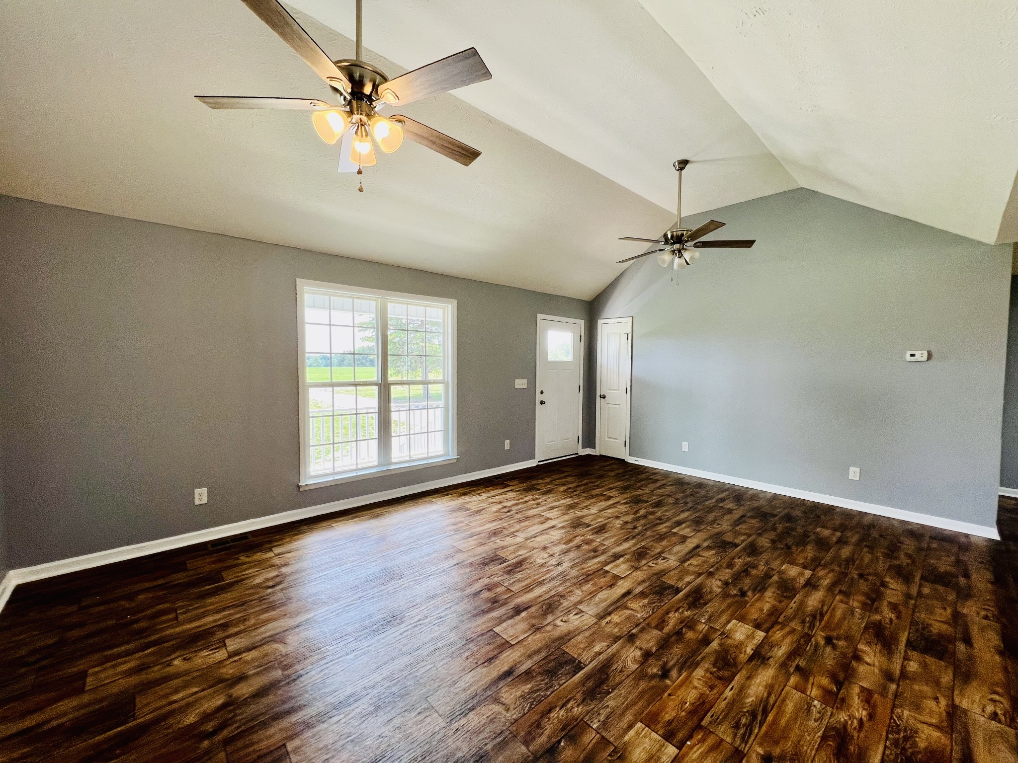 4560 Fall River Road Pulaski, TN 38478 - Photo 20 of 28 wooden floor in an empty room with a window