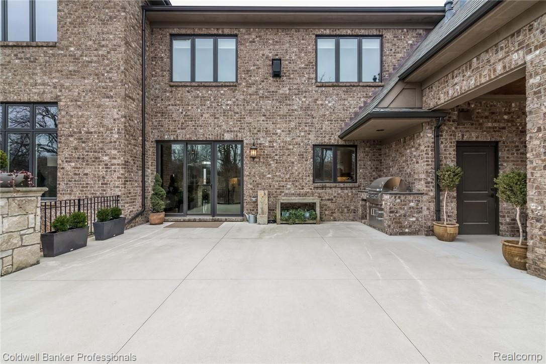 3762 Thatcher Drive Rochester, MI 48309 - Photo 66 of 76 Patio and outdoor grill conveniently located to lanai and kitchen
