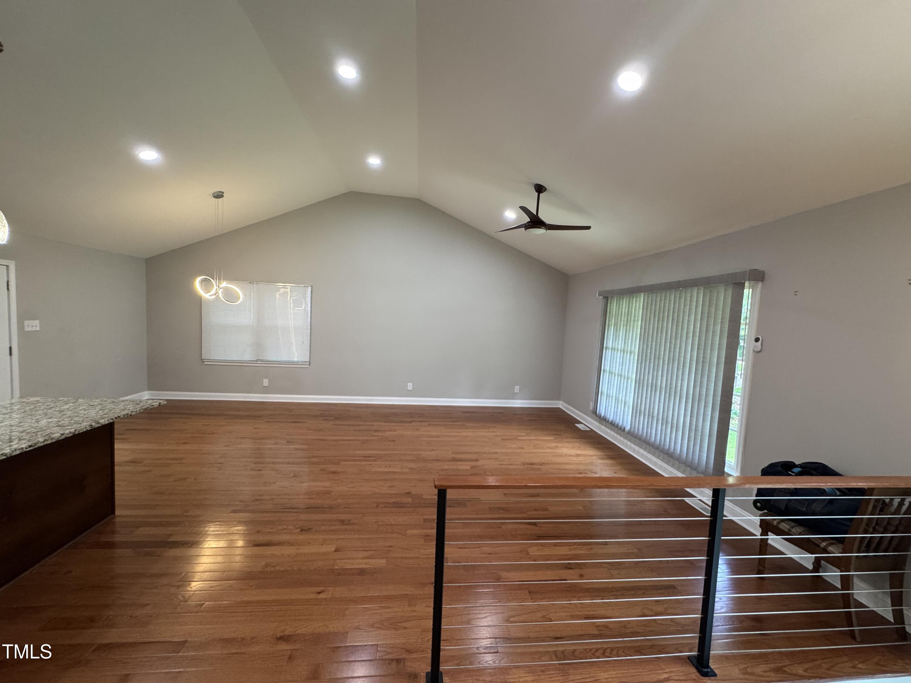 1513 Shelley Road Raleigh, NC 27612 - Photo 3 of 24 a view of room with window and hardwood floor