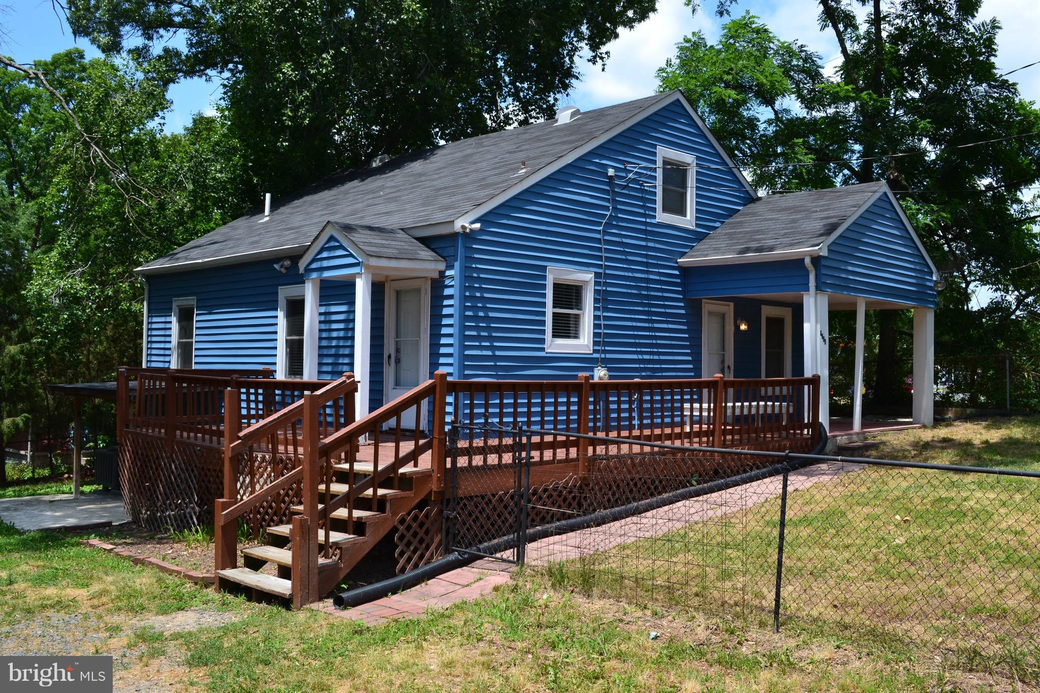 9300 Sanger Street Lorton, VA 22079 - Photo 2 of 16 a view of a house with a yard