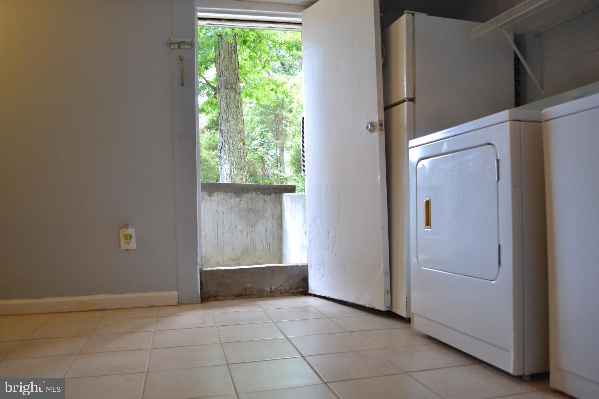 9300 Sanger Street Lorton, VA 22079 - Photo 16 of 16 a view of an empty room with a window