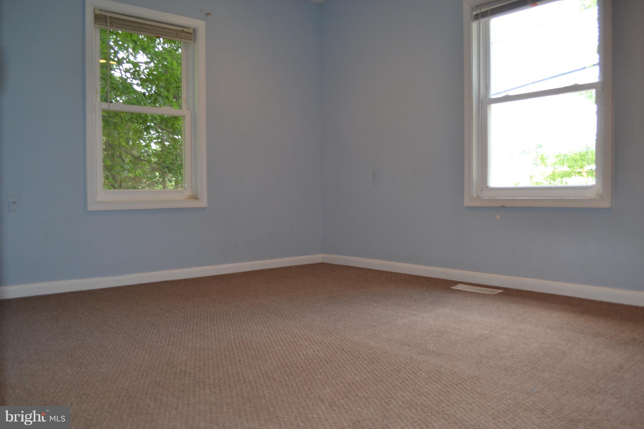 9300 Sanger Street Lorton, VA 22079 - Photo 9 of 16 an empty room with a window