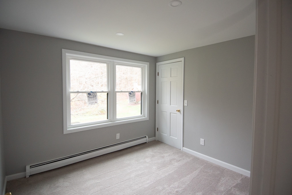 2 Mountain Rd Estates, Unit C Gill, MA 01354 - Photo 9 of 17 an empty room with a window