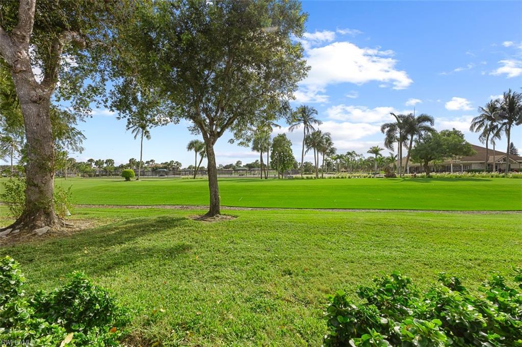 197 Harrison Road, Unit 3 Naples, FL 34112 - Photo 14 of 14 View of home's community featuring golf course view and a yard