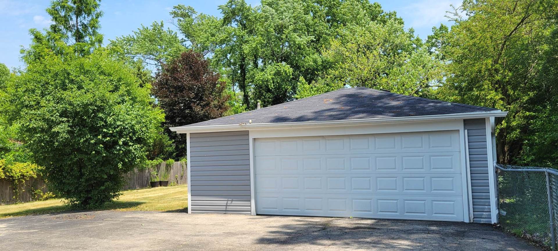 7129 Clarendon Hills Road Darien, IL 60561 - Photo 8 of 9 a front view of a house with a garage