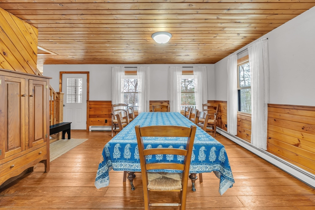 300 Padre Road New Braintree, MA 01531 - Photo 14 of 34 a dining room with furniture and wooden floor