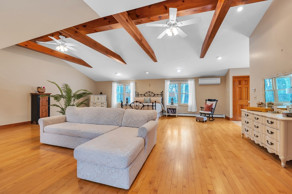 300 Padre Road New Braintree, MA 01531 - Photo 20 of 34 a living room with furniture and a wooden floor