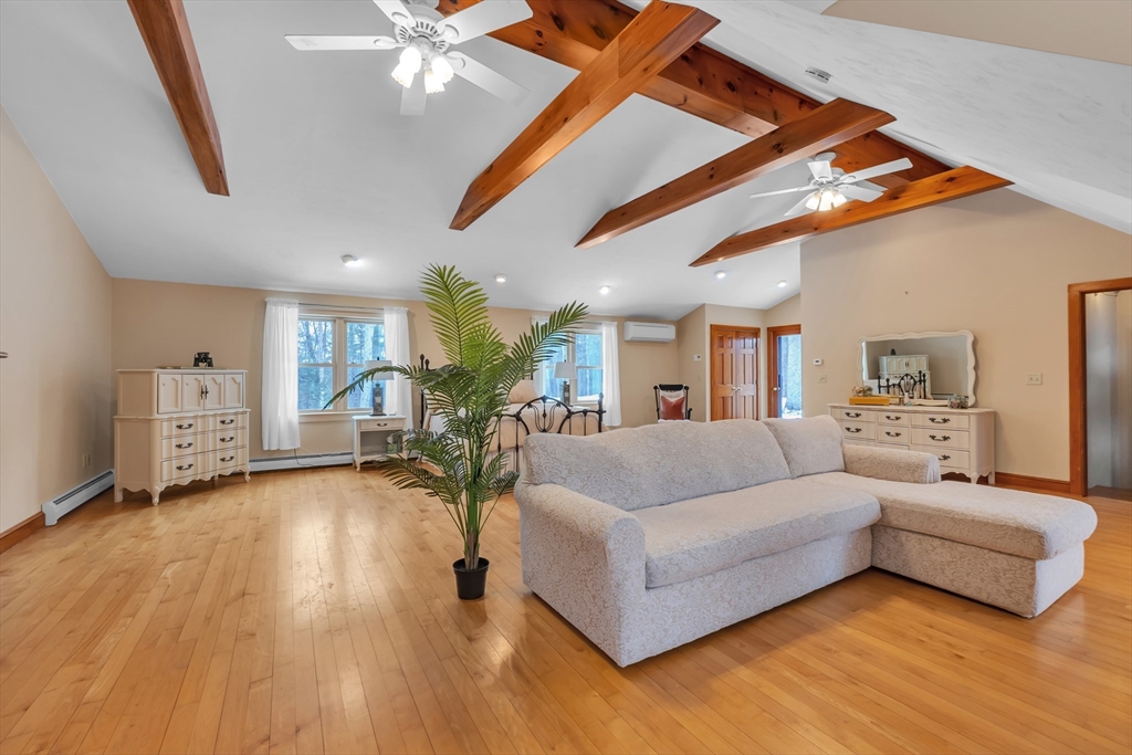 300 Padre Road New Braintree, MA 01531 - Photo 21 of 34 a living room with furniture and a wooden floor