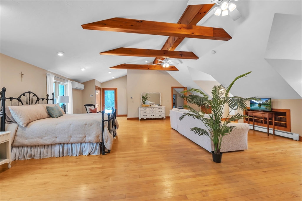 300 Padre Road New Braintree, MA 01531 - Photo 22 of 34 a living room with furniture and a table