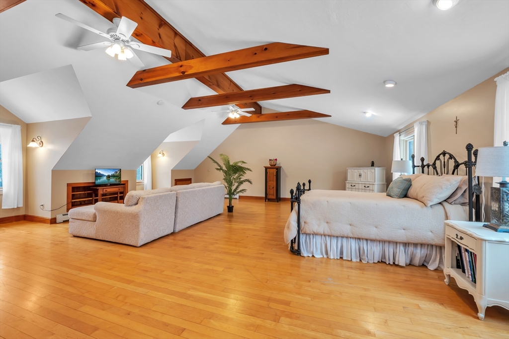 300 Padre Road New Braintree, MA 01531 - Photo 24 of 34 a living room with furniture and a wooden floor