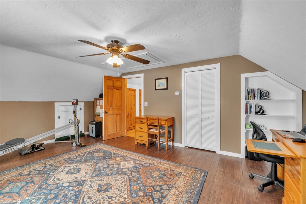 300 Padre Road New Braintree, MA 01531 - Photo 31 of 34 a living room with furniture and a flat screen tv