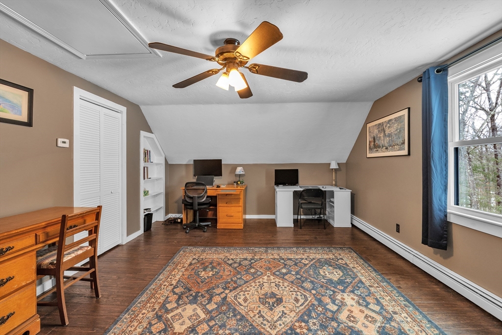 300 Padre Road New Braintree, MA 01531 - Photo 32 of 34 a living room with furniture and a fireplace