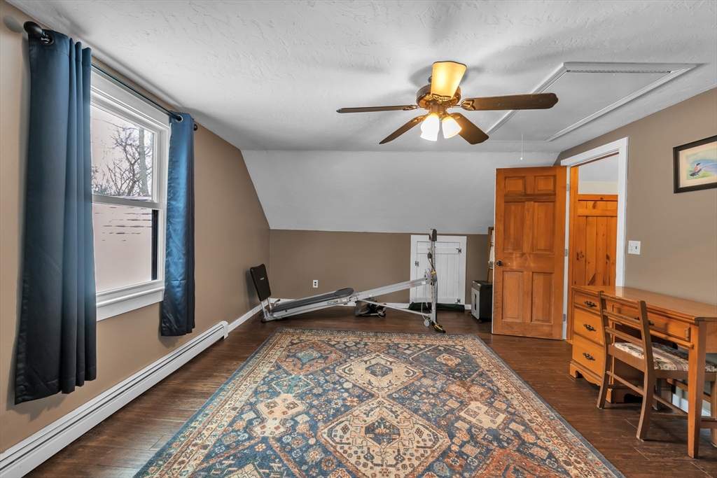 300 Padre Road New Braintree, MA 01531 - Photo 33 of 34 a room with wooden floor and window