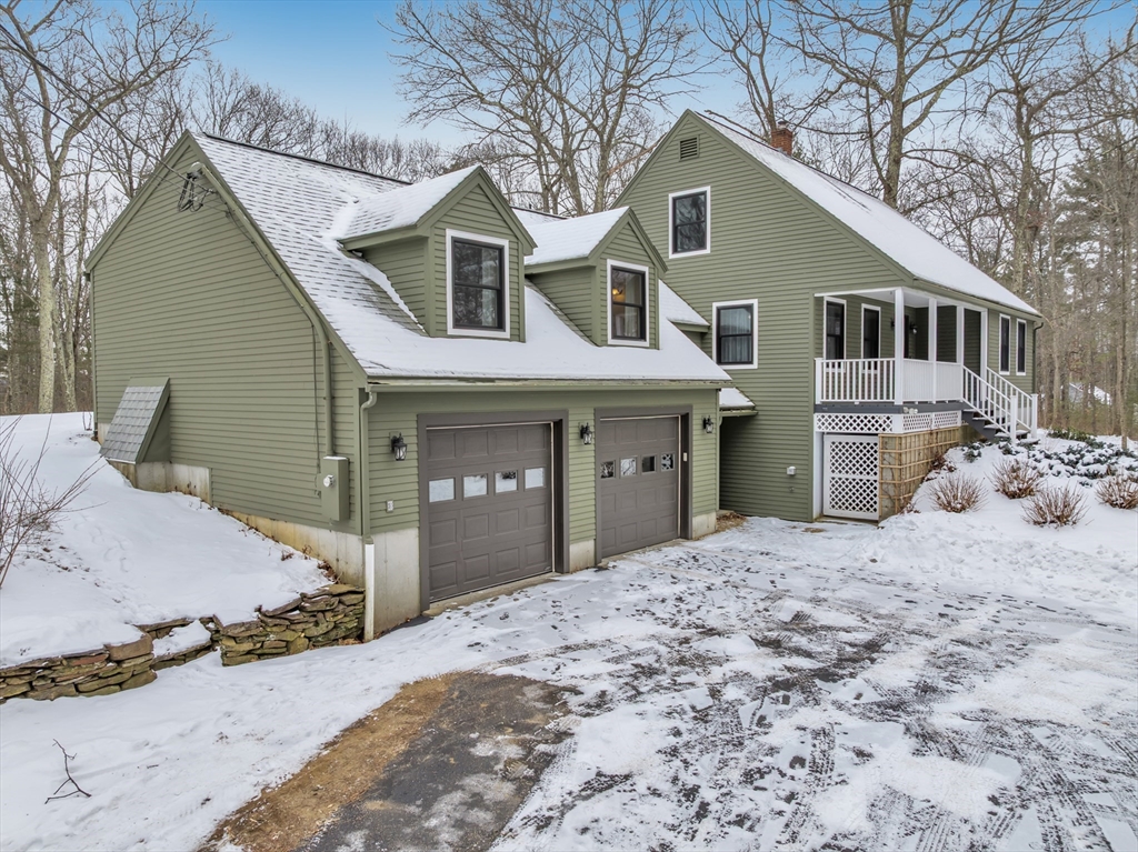 300 Padre Road New Braintree, MA 01531 - Photo 4 of 34 a front view of a house with a yard