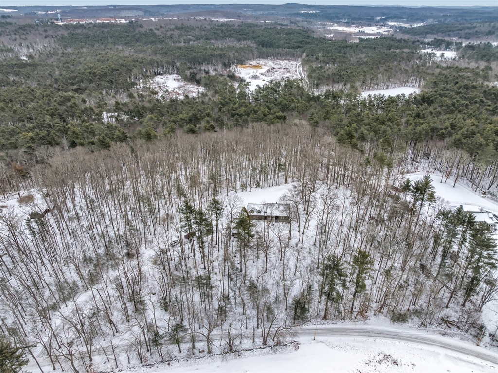 300 Padre Road New Braintree, MA 01531 - Photo 9 of 34 a view of lake with lots of trees