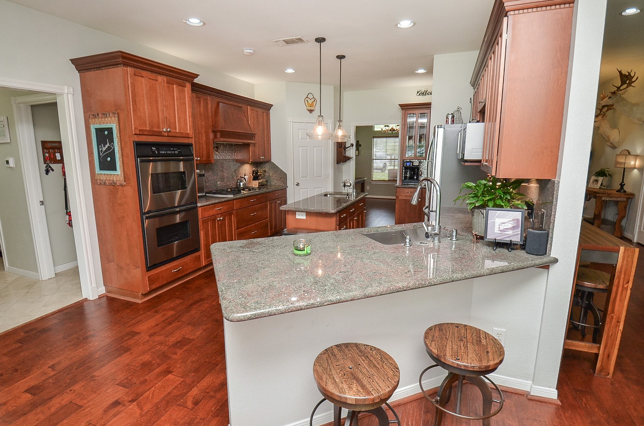 27644 Spring Hill Road Hempstead, TX 77445 - Photo 18 of 50 This lovely, extended counter top invites comfy stools for quick snacks!