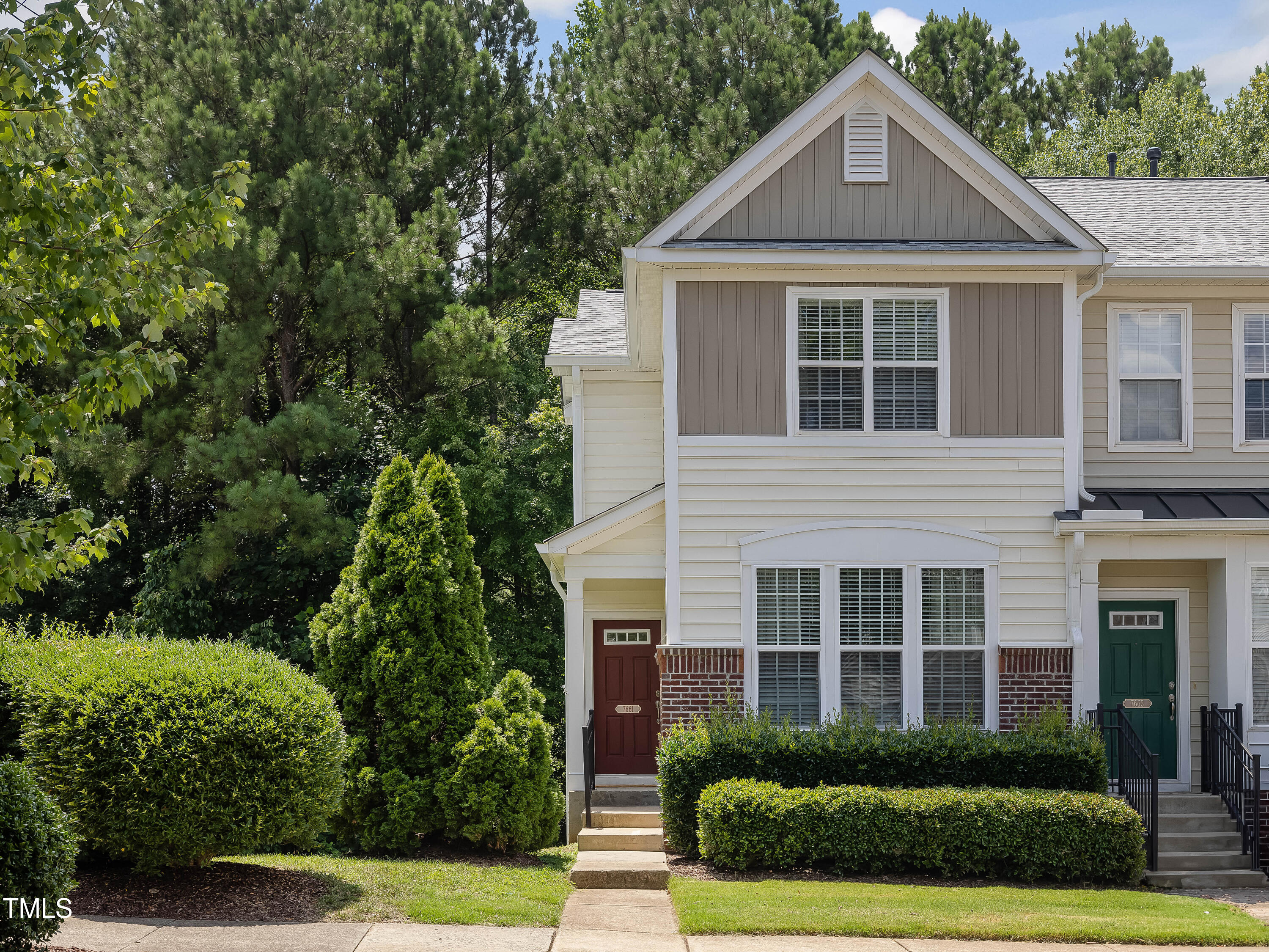 7661 Winners Edge Street Raleigh, NC 27617 - Photo 13 of 13 a front view of a house with a yard
