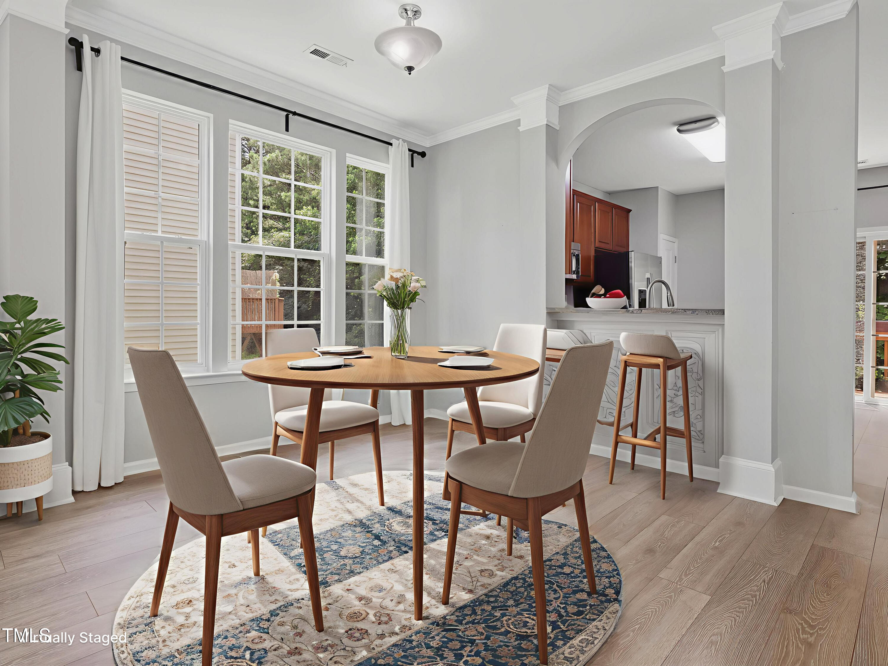 7661 Winners Edge Street Raleigh, NC 27617 - Photo 3 of 13 a dining room with furniture and window