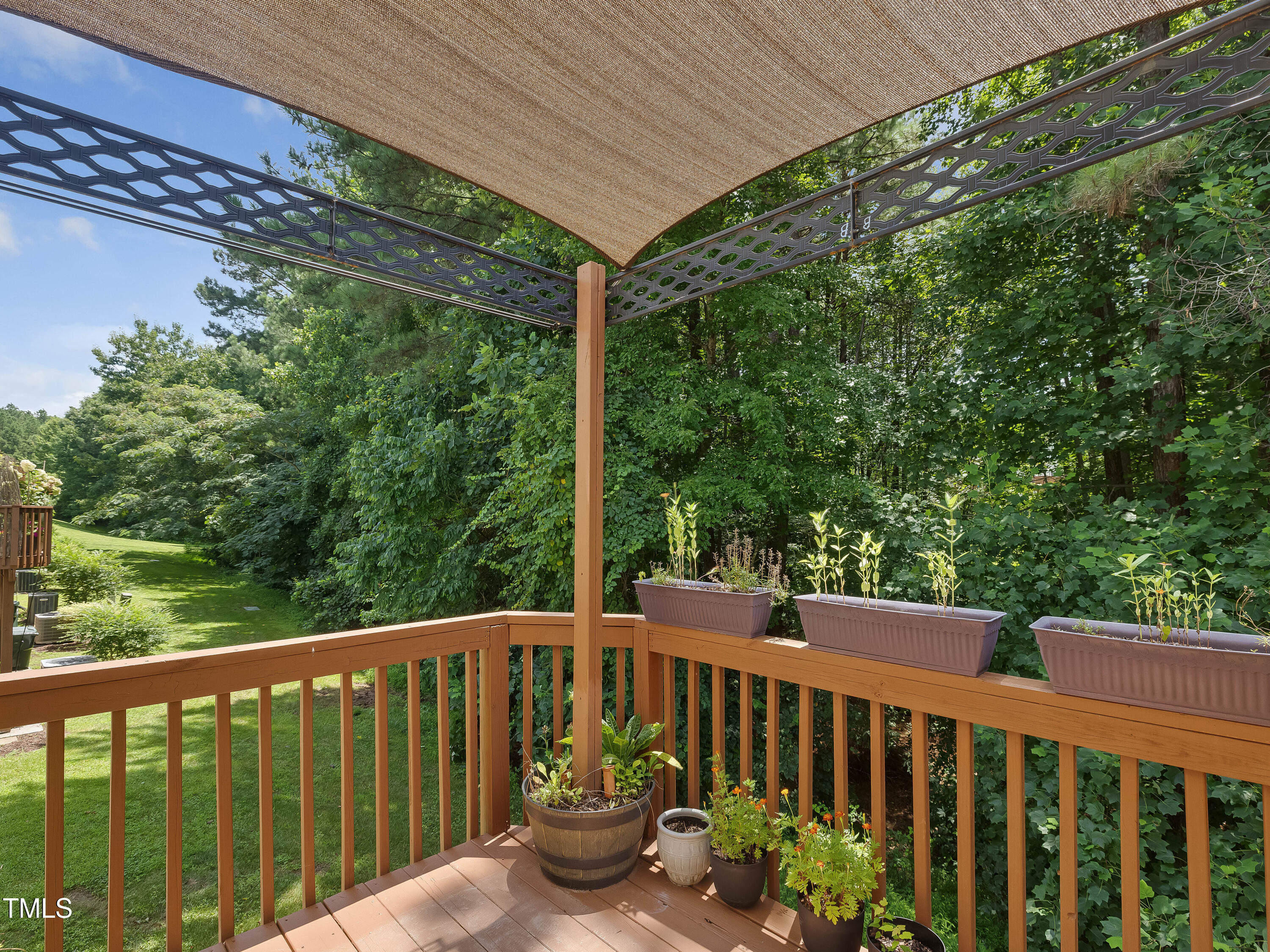 7661 Winners Edge Street Raleigh, NC 27617 - Photo 7 of 13 a view of a wooden deck