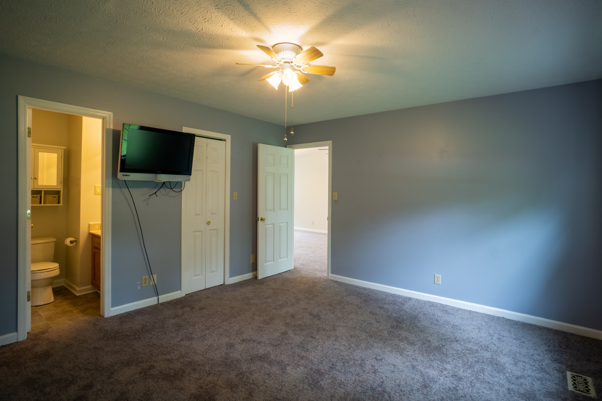 1035 Garton Road Burns, TN 37029 - Photo 14 of 31 a view of a livingroom with a flat screen tv