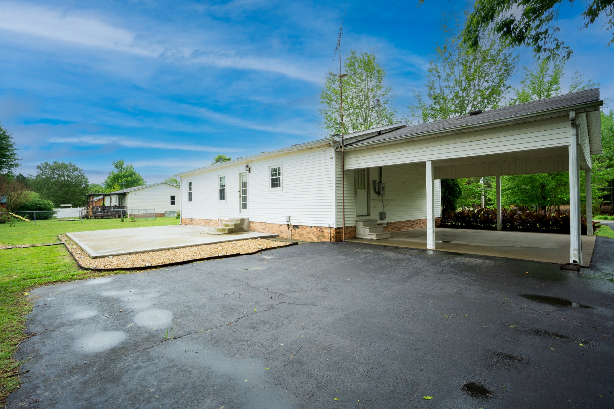 1035 Garton Road Burns, TN 37029 - Photo 25 of 31 a view of a house with a yard