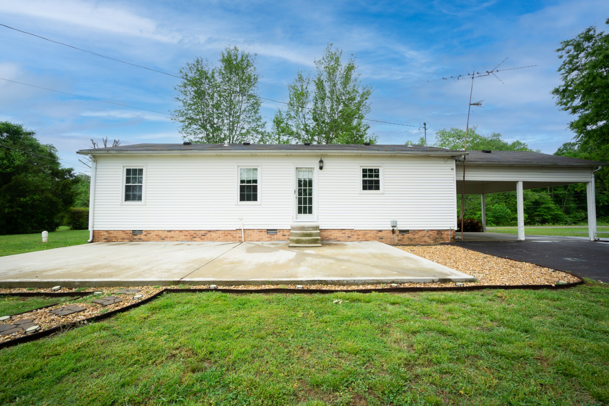 1035 Garton Road Burns, TN 37029 - Photo 26 of 31 a house view with a backyard space