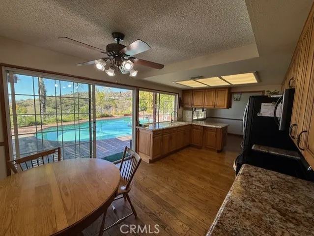 a view of a livingroom with furniture and window