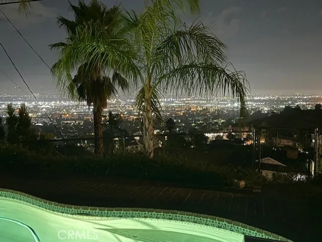 a view of a porch with potted plants