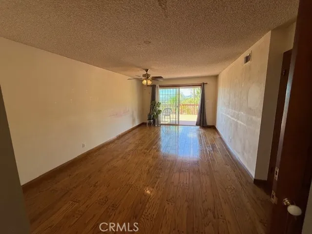 a view of a swimming pool with a table and chairs