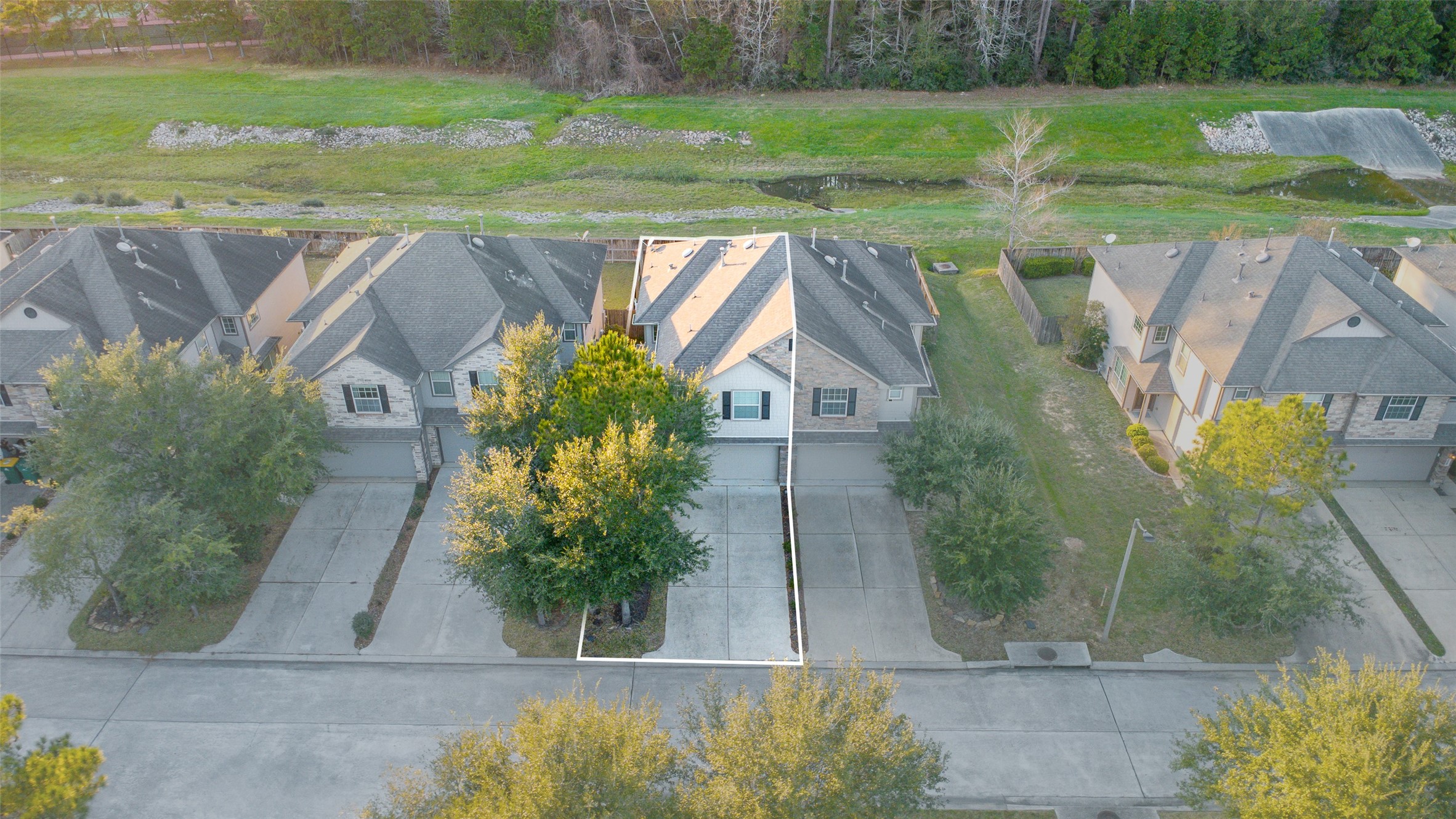 267 Bloomhill Place Magnolia, TX 77354 - Photo 16 of 19 Aerial view showcasing the front of the home.