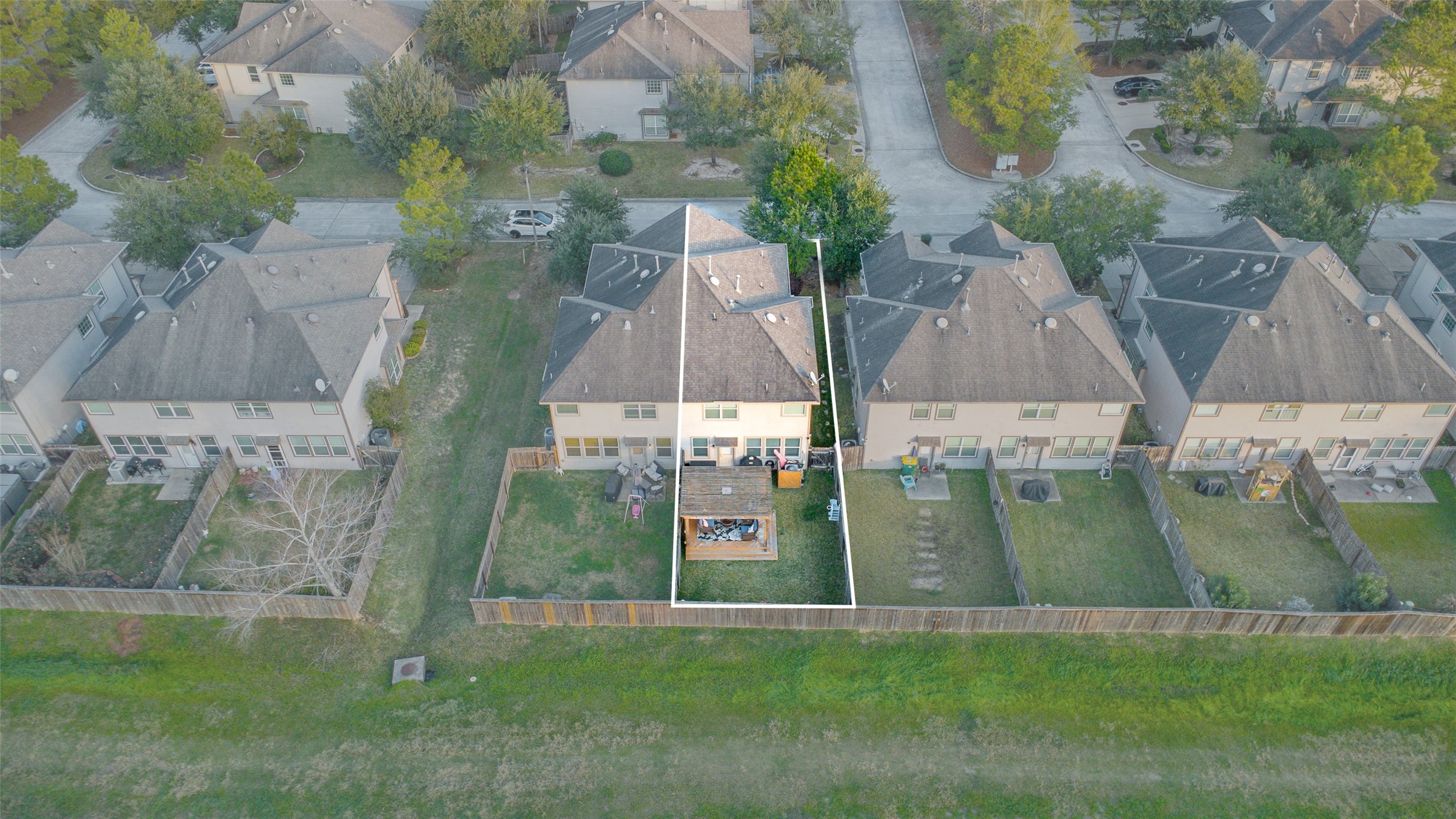 267 Bloomhill Place Magnolia, TX 77354 - Photo 17 of 19 This aerial shot highlights the backyard oasis, showcasing a private and inviting outdoor space perfect for relaxation and entertaining.