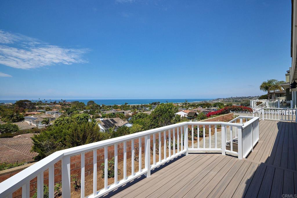 717 Barbara Avenue Solana Beach, CA 92075 - Photo 31 of 40 a view of a balcony with wooden floor and city view