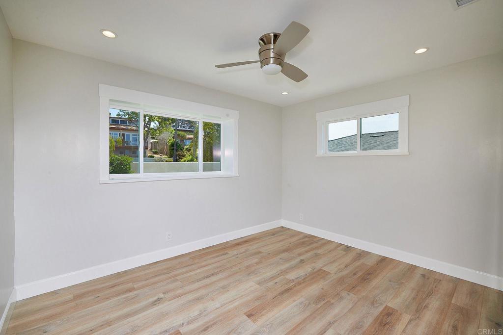 717 Barbara Avenue Solana Beach, CA 92075 - Photo 38 of 40 a view of empty room with wooden floor