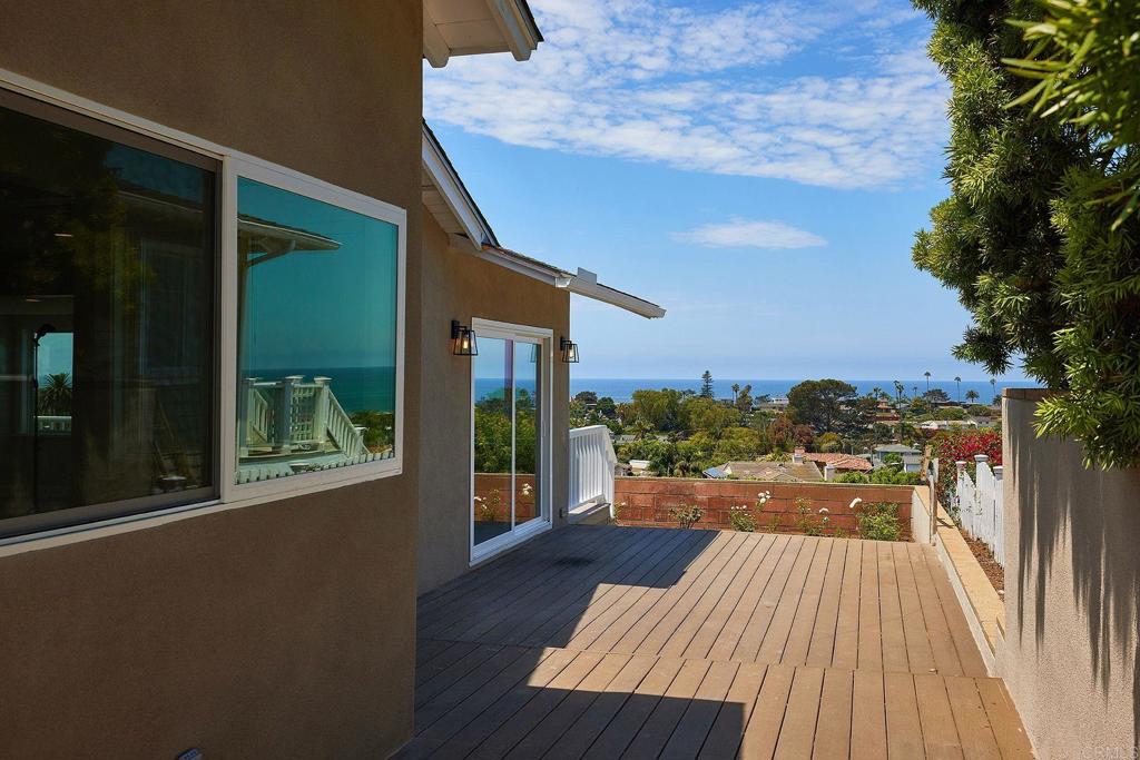 717 Barbara Avenue Solana Beach, CA 92075 - Photo 39 of 40 a view of a balcony with wooden floor and outdoor space