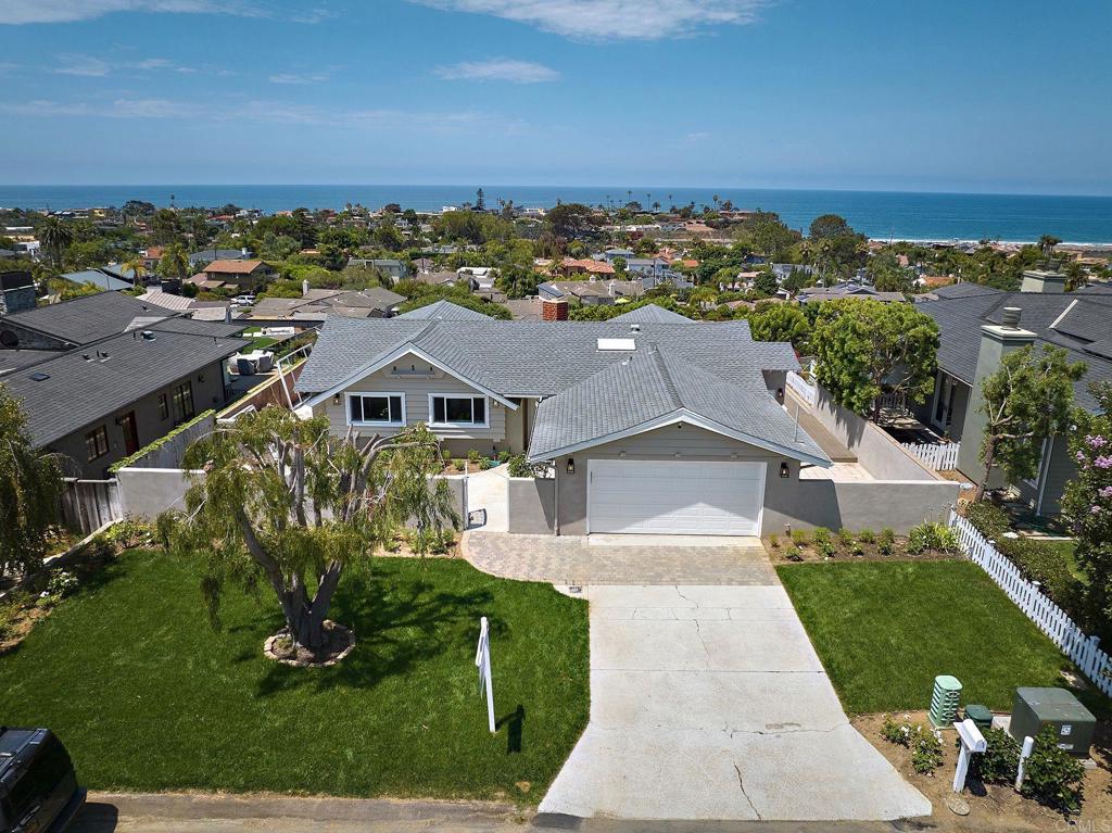 717 Barbara Avenue Solana Beach, CA 92075 - Photo 4 of 40 an aerial view of a house with a yard