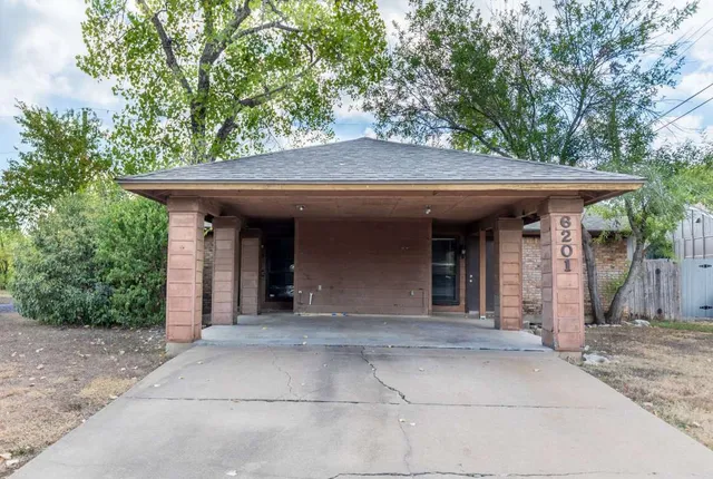 a view of a house with a porch